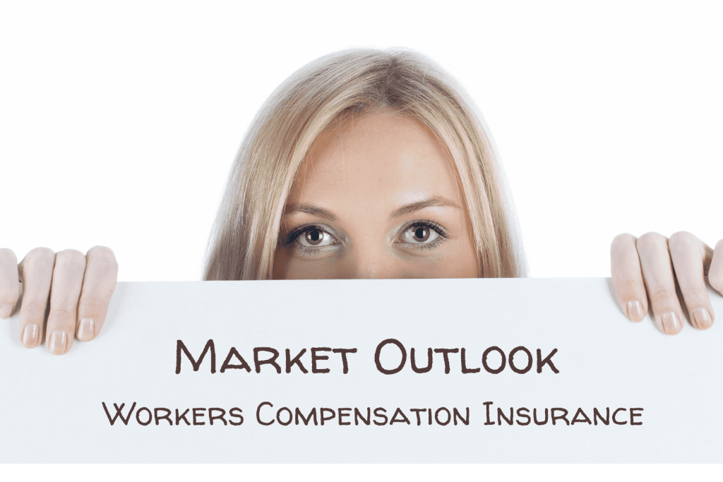 woman holding up workers compensation sign