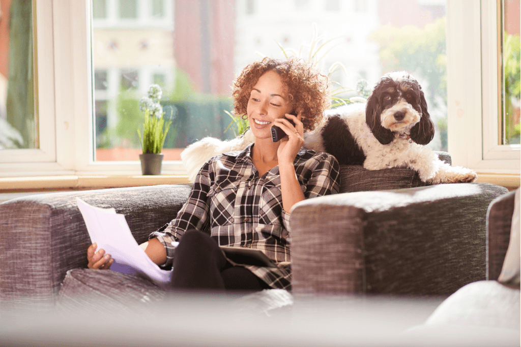 a woman on the phone inquiring about a pet insurance policy